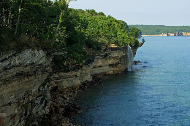 hiking to spray falls in pictured rocks national lakeshore